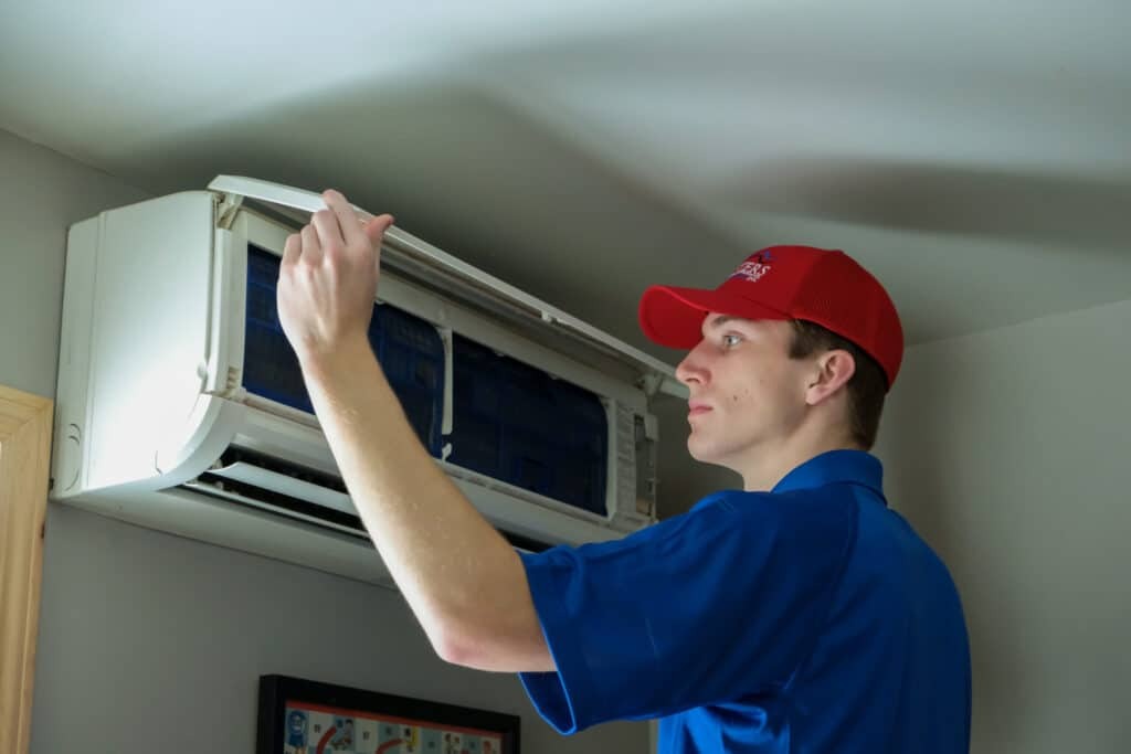 Technician repair mini duct systerm