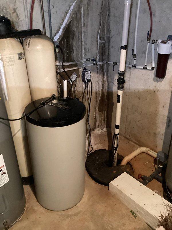 Berne, IN - # Service Summary

Completed scheduled tanked water heater maintenance flush at residential property. Successfully drained sediment from water heater tank, inspected all plumbing connections and water treatment equipment in utility area, and verified proper operation of system components. All equipment functioning normally with no leaks detected upon completion.