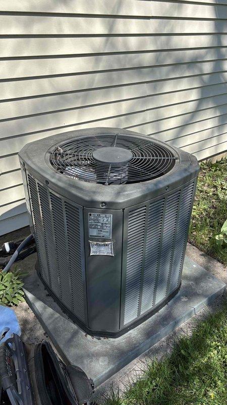 Completed comprehensive air conditioning tune-up on outdoor condenser unit, performing standard maintenance procedures including electrical testing with digital clamp meter to verify proper amperage draw and system performance. Also performed furnace tune-up as coordinated service (documented on separate ticket).