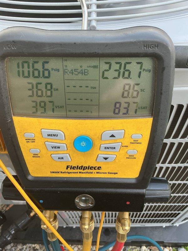 New Haven, IN - Performed callback service on HVAC system utilizing R454B refrigerant. Connected Fieldpiece SMAN digital manifold gauge set to verify system pressures, superheat, and subcooling values, confirming proper refrigerant charge and system operation following previous service work.