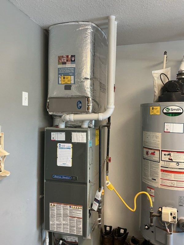 Performed second opinion evaluation of residential HVAC system following previous diagnosis of cracked heat exchanger. Conducted comprehensive inspection of gas furnace, air handler, and outdoor condensing unit to verify reported heat exchanger failure and identify any additional system deficiencies. Documented current equipment condition through photographic assessment of indoor heating components and outdoor AC unit. Provided detailed estimate for complete HVAC system replacement including new gas furnace and air conditioning equipment to address identified safety concerns and system failures.