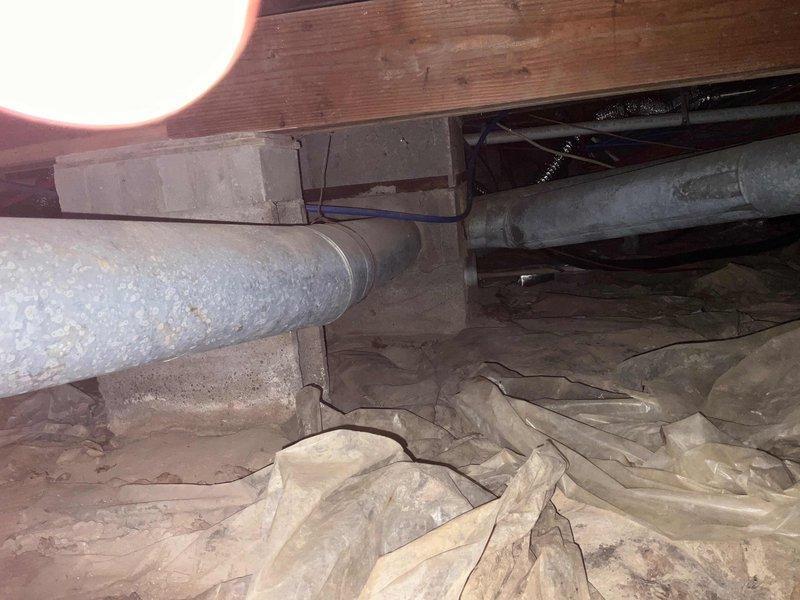 Conducted site assessment for furnace relocation from main floor hallway to mud room area. Evaluated crawl space access, existing ductwork configuration, and structural considerations for proposed equipment move. Inspected current HVAC system layout, including insulated supply ducts and vapor barrier conditions in crawl space. Documented existing installation and staging area to determine feasibility of relocating furnace unit while maintaining proper clearances and code compliance. Coordinated assessment with planned plumbing modifications to ensure compatible utility routing for the proposed relocation project.