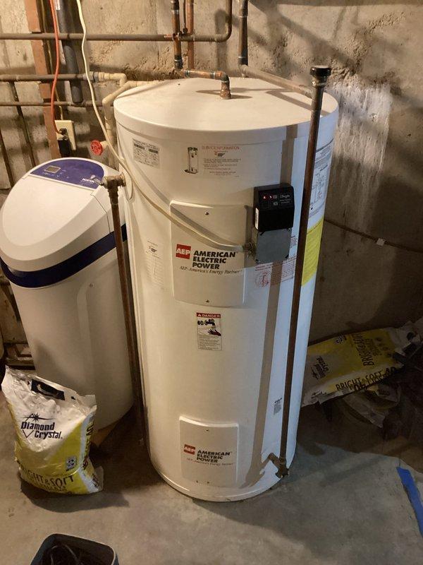 Decatur, IN - Performed routine maintenance on an American Electric Power tanked water heater, including a complete flush of the tank to remove sediment buildup and ensure optimal heating efficiency. Inspected all plumbing connections, valves, and the control panel for proper operation, with all components found to be functioning correctly. The water heater and associated piping system were left in good working condition.
