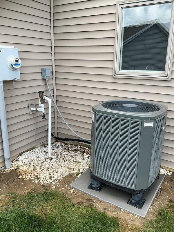 Completed cooling season tune-up on Trane XR 13 air conditioning condenser unit, model 4TWR3030C1000AA. Performed comprehensive system inspection including electrical connections, refrigerant levels, and airflow verification through louvered panels. Unit operating within manufacturer specifications with all components functioning properly.