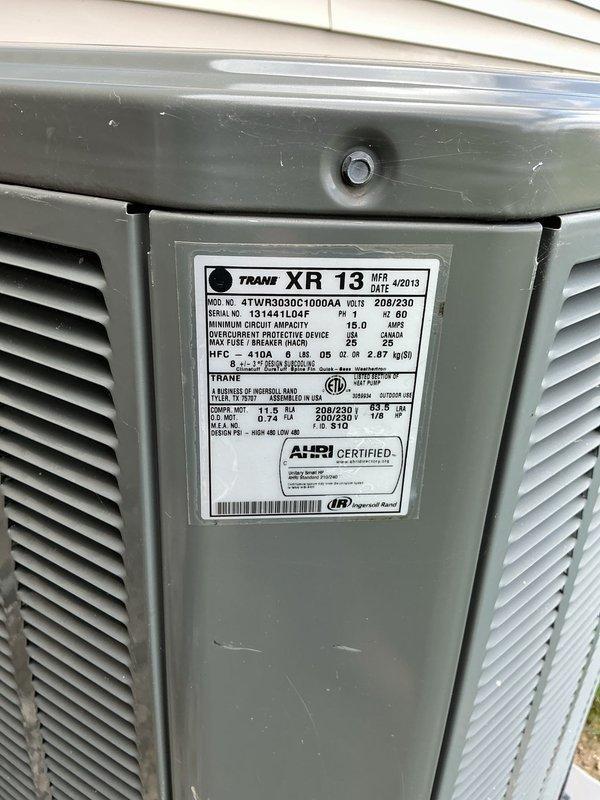 Completed cooling season tune-up on Trane XR 13 air conditioning condenser unit, model 4TWR3030C1000AA. Performed comprehensive system inspection including electrical connections, refrigerant levels, and airflow verification through louvered panels. Unit operating within manufacturer specifications with all components functioning properly.