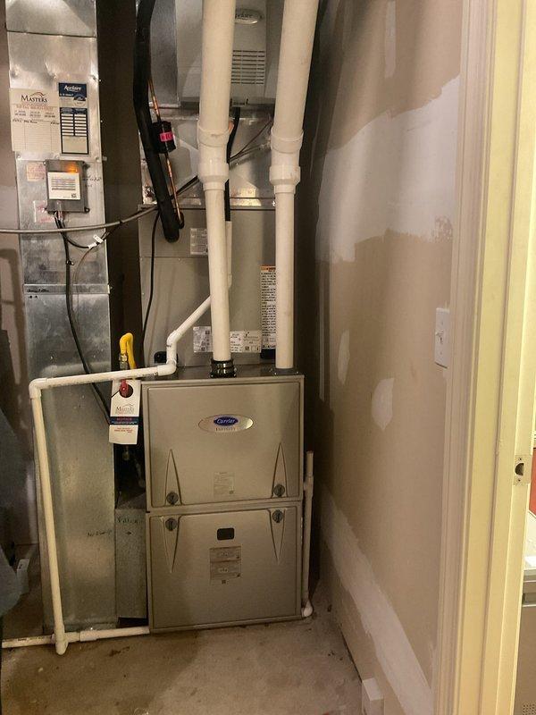 # HVAC Install - A/C & Coil Job Summary

Completed full installation of Carrier Comfort Series 26SCA448N003 single-stage air conditioning unit with matching CVAVA4821XMA evaporator coil. Removed and recycled existing outdoor condenser and indoor coil, ensuring proper disposal of refrigerant per EPA regulations. Installed new 2" PVC condenser pad for outdoor unit placement and mounted equipment with new disconnect and whip. Reconnected unit to existing line set after thorough flushing and pressure testing to verify system integrity. Inside the utility area, installed new evaporator coil and reconnected to existing supply and return ductwork. Performed complete refrigerant charge, leak test, and system startup. Verified proper airflow, temperature differential, and electrical connections throughout. Completed post-installation quality assurance inspection, explained thermostat operation and system functionality to homeowner, and registered manufacturer warranty for both units. Protected 