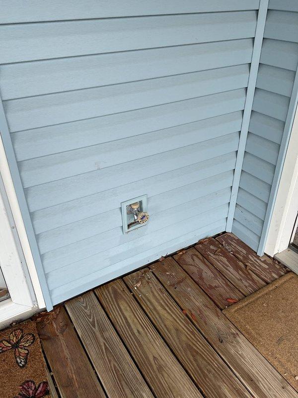 Performed routine maintenance on tanked gas water heater located in garage, including complete tank flush to remove sediment buildup and ensure optimal heating efficiency. Inspected plumbing connections and brass fittings on copper supply lines for proper operation. Assessed exterior hose bibs and noted existing leakage conditions on both front and rear spigots for potential future replacement.