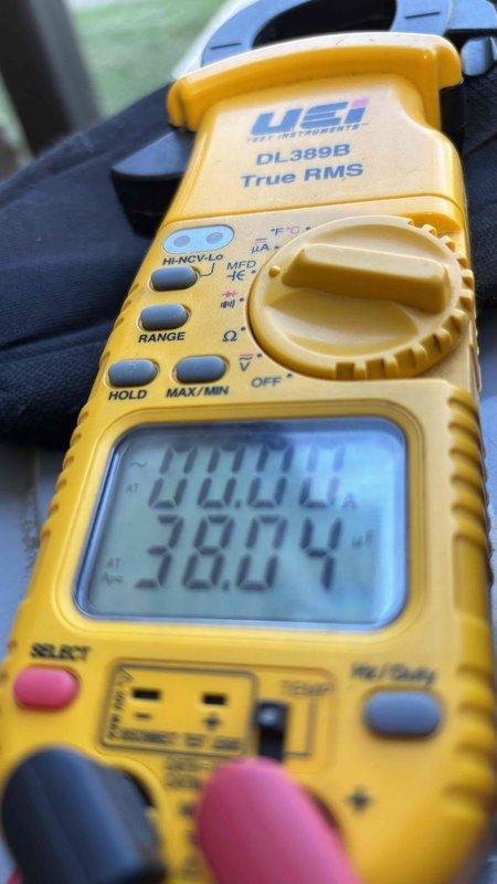 Completed final prepaid cooling maintenance visit for system one of two units. Performed standard preventive maintenance inspection and testing procedures. Utilized digital multimeter to verify electrical parameters and measure capacitor performance, confirming proper capacitance values and system operation within manufacturer specifications. All components found operating normally with no deficiencies noted.