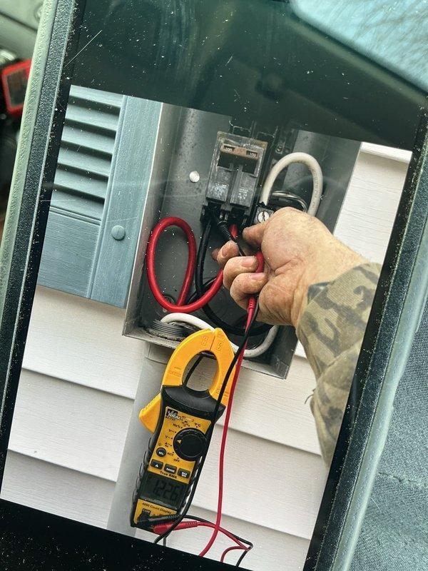 Performed electrical diagnostics and measurements on existing electrical panel using digital clamp meter to assess system capacity and verify proper operation in preparation for approved panel upgrade. Conducted voltage and amperage testing at main disconnect to establish baseline electrical parameters and ensure safe working conditions for upcoming service upgrade work.