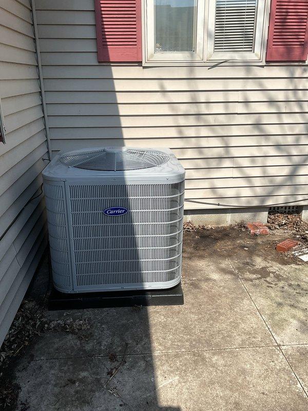 Completed full HVAC system replacement including installation of Carrier Performance Series two-stage air conditioner model 26TPA836W003 and Carrier Performance Series variable speed air handler model FT5ANXC36L00. Removed and properly recycled existing equipment. Installed new 2-inch PVC condenser pad and positioned outdoor unit on concrete base. Reconnected unit to existing line set after performing complete flush and pressure test to ensure system integrity. Installed new electrical disconnect and whip for outdoor condenser unit. Reconnected all existing supply and return ductwork to new air handler. Installed Honeywell Vision PRO TH8321R1001 programmable thermostat and provided operational instruction. Performed comprehensive system startup and testing using manifold gauges to verify refrigerant pressures, superheat, and subcool readings within manufacturer specifications. Conducted post-installation quality assurance inspection and complete system walkthrough. Registered equipment