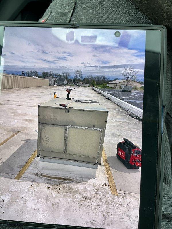 Performed preventative maintenance inspection on commercial rooftop unit. Accessed RTU on flat membrane roof, conducted visual assessment of exterior cabinet condition and mounting. Inspected interior components including ductwork connections, wiring, insulation integrity, and mechanical systems within the unit. Documented equipment condition with photographs and noted that any required repairs must be communicated to property owner per lease agreement.