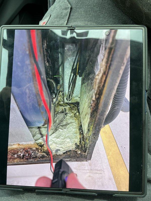 Performed preventative maintenance inspection on commercial rooftop unit. Accessed RTU on flat membrane roof, conducted visual assessment of exterior cabinet condition and mounting. Inspected interior components including ductwork connections, wiring, insulation integrity, and mechanical systems within the unit. Documented equipment condition with photographs and noted that any required repairs must be communicated to property owner per lease agreement.