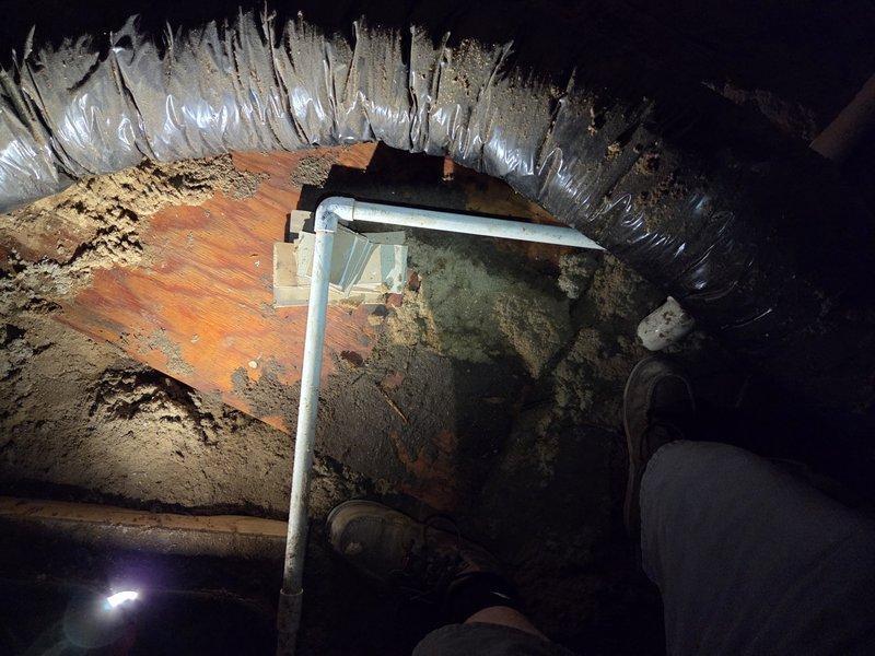 Responded to emergency no-cool call for attic-mounted air conditioning system causing severe water damage to kitchen ceiling and floor. Upon arrival, discovered extensive ice formation on supply ductwork in attic space, indicating complete evaporator coil freeze-up due to restricted airflow. Primary condensate drain line was experiencing overflow condition, causing water to drip through ceiling penetration into living space below. Unit had been shut down by occupant prior to arrival to prevent further water damage.

Performed comprehensive system diagnostics to identify root cause of freeze condition. Inspected evaporator coil, refrigerant levels, and airflow components. Checked air filter status and verified blower motor operation. Assessed condensate drainage system including primary drain line, secondary overflow protection, and drain pan condition. Evaluated outdoor condensing unit for proper operation and verified electrical connections at junction box.

Allowed sufficient time fo