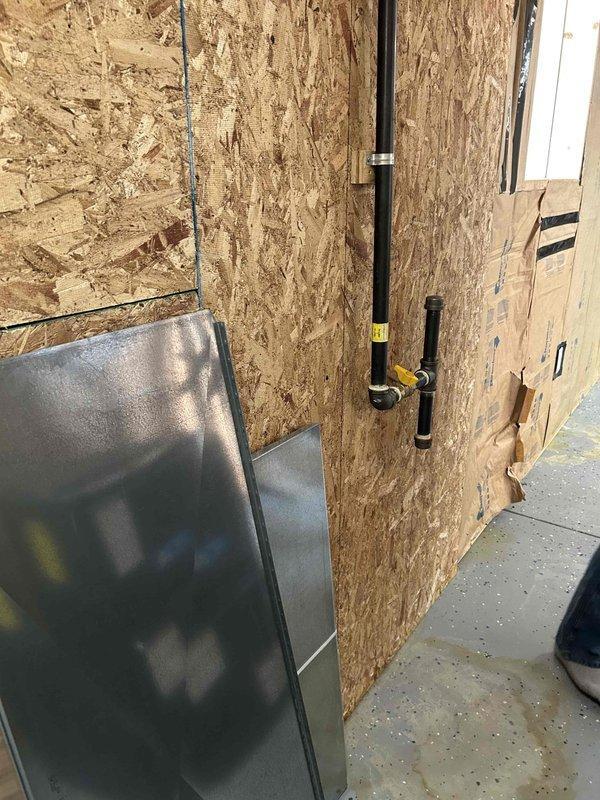 Provided estimate for HVAC system installation in new construction home where customer has already purchased equipment and roughed in ductwork. Assessed installation site and confirmed main plenum installation will be required to connect new unit to existing ductwork. Documented electrical panel configuration and equipment staging area to prepare comprehensive installation quote.